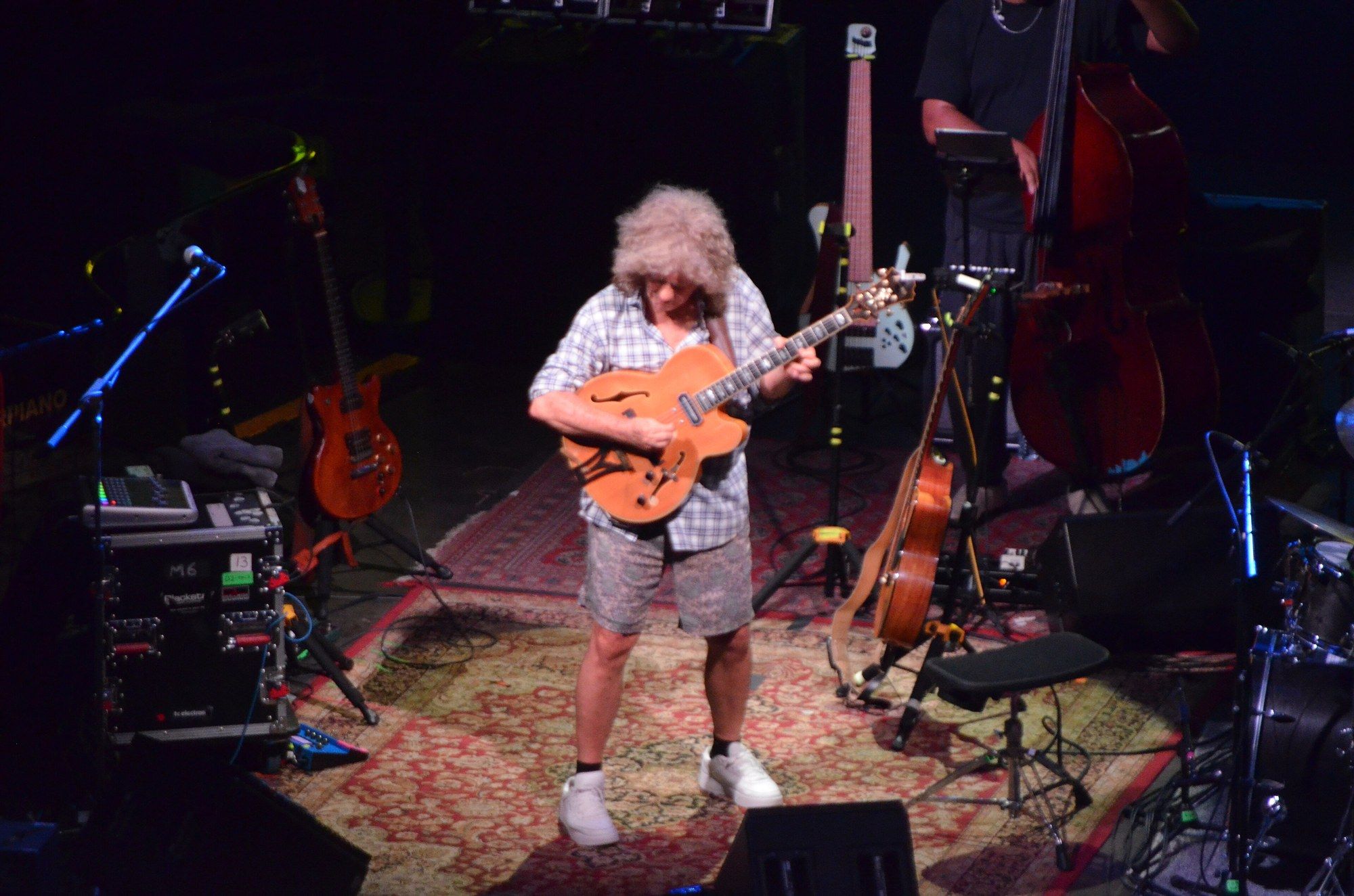Pat Metheny standing center stage playing guitar at the San Javier Jazz Festival, July 22, 2026